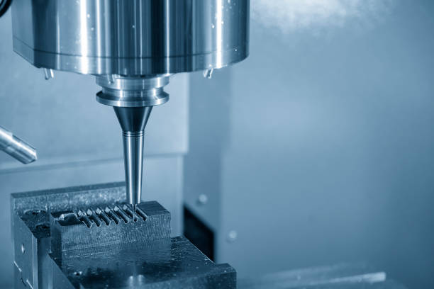 istock The CNC milling machine cutting the injection mold part with the solid ball endmill too 1017531646