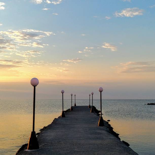 istock Sunrise on the small pier 1017551430