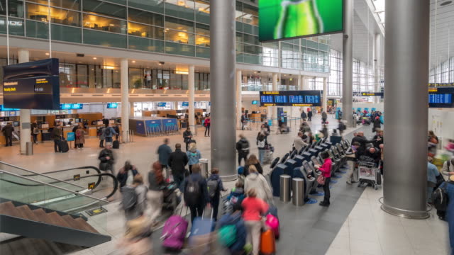 Time-lapse Traveler Crowd at Airport departure hall Copenhagen Denmark