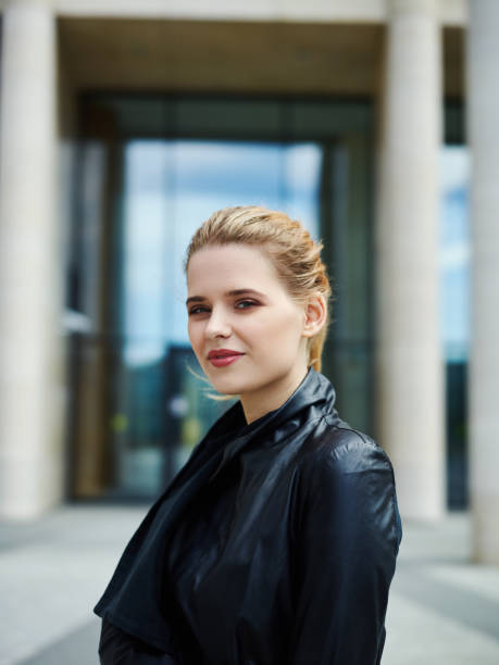 istock Content businesswoman in leather jacket 1017557036