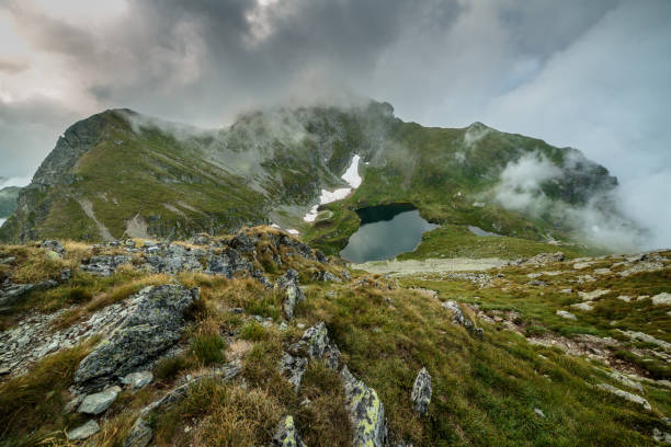 istock Lake Capra in Fagaras mountains, Romania 1017569016