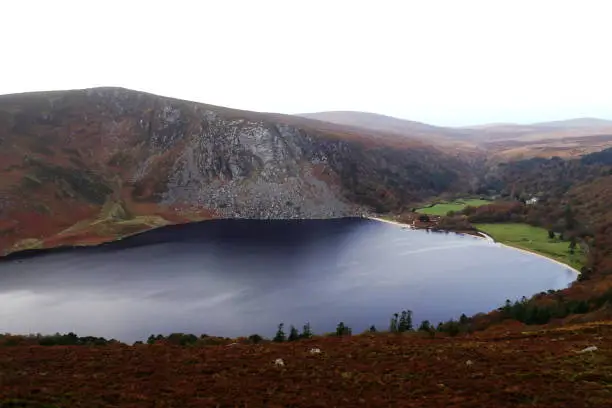Photo of Famous Guinness Lake Lough Tay in the Wicklow Mountains in Ireland