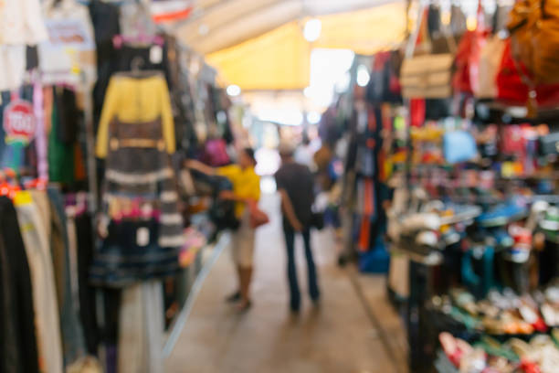 istock Abstract blurred people shopping at second hand market for background 1017577918