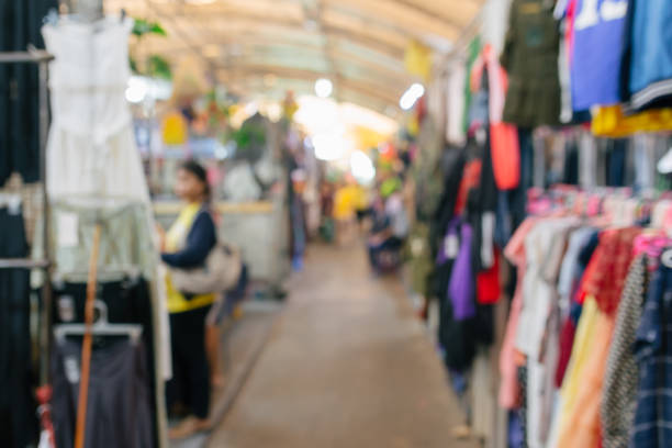 istock Abstract blurred people shopping at second hand market for background 1017580116