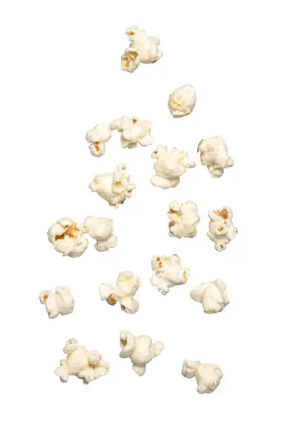 Popcorn falling isolated on white background.