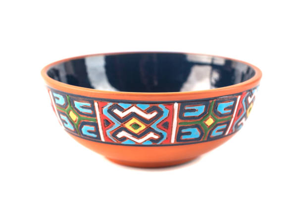 istock Georgian clay pottery (tasi) with traditional ornaments on it. White background 1017580402