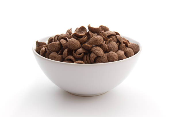 istock Chocolate cereals in white bowl isolated on white background 1017588508
