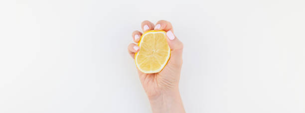 istock Woman hand with lemon 1017594220