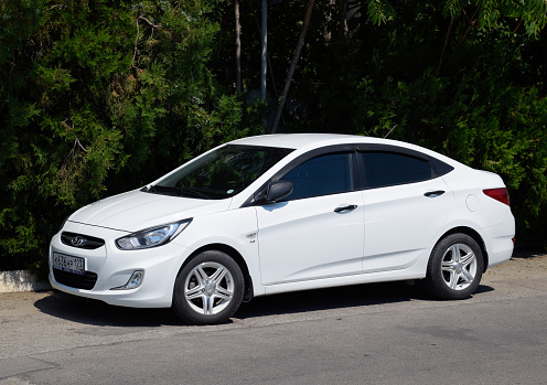 Portocolom, Spain - 19th February, 2019: Toyota Corolla Touring Sports hybrid car stopped on a parking. The Corolla is the most popular car model in the world.