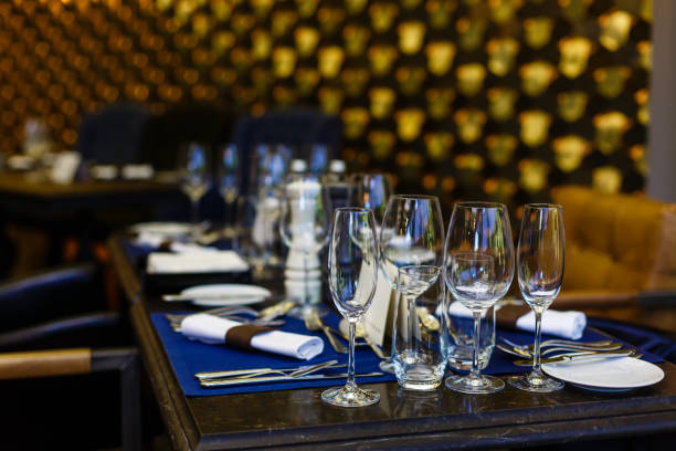 istock Glasses and plates on the serving table 1017599720