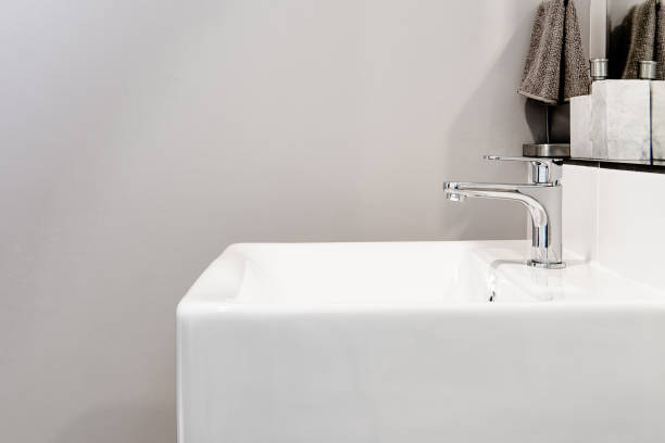 istock Bathroom interior with sink and faucet 1017602002