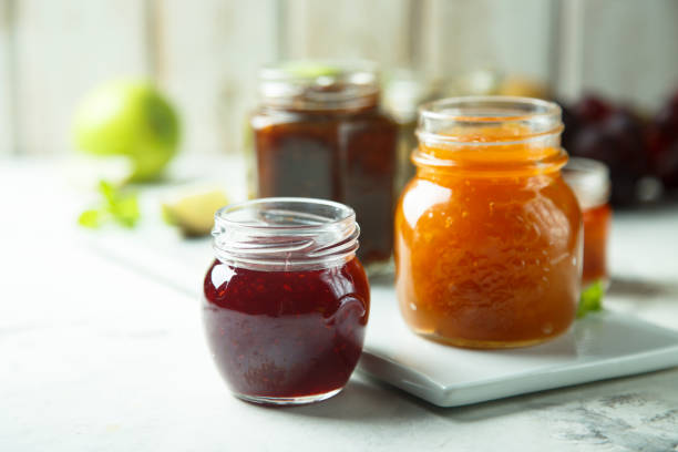 варенье - preserves jar apricot marmalade стоковые фото и изображения