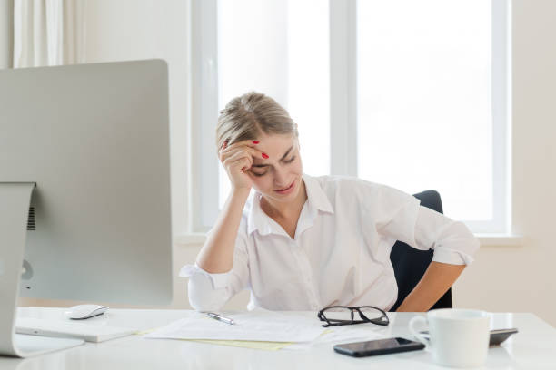 istock Sad unhappy woman suffering from a stomachache 1017634266