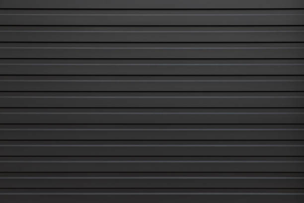 black corrugate wall background and texture, black metal panel