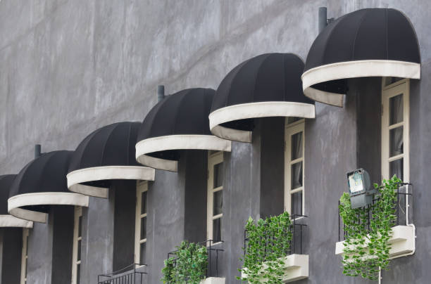 black awning over windows at house canopy.