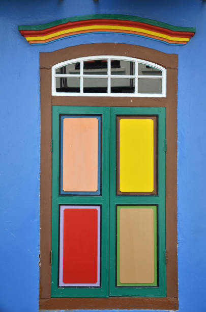 istock Colorful windows and details on a colonial house 1017652554