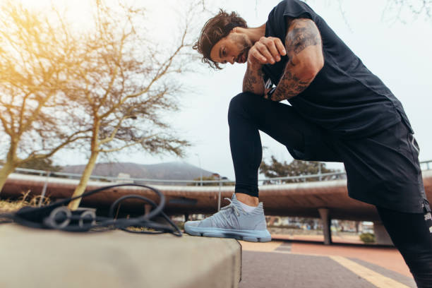 istock Sportsman taking a break from outdoor training 1017652598