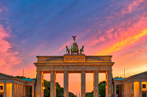 Stunning view of the Brandenburg Gate in Berlin at dusk, with colorful twilight in background, Berlin, Germany