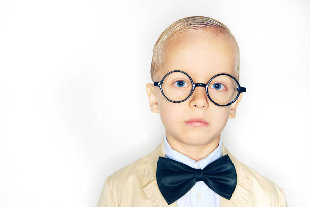 studio shot of stylish boy in glasses - child prodigy imagens e fotografias de stock