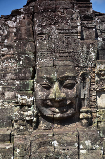 istock Faces of ancient Bayon Temple At Angkor Wat 1017658880