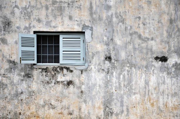 istock Vintage window on a old building 1017658892