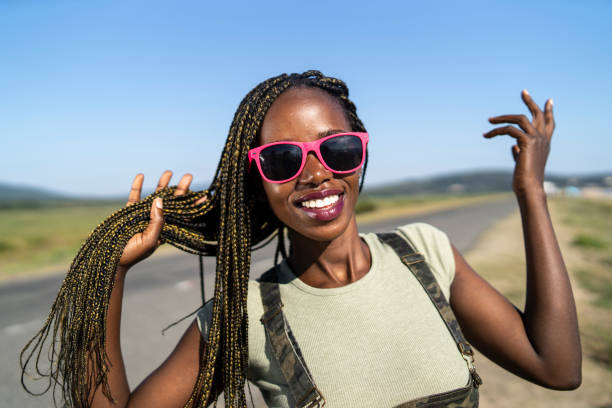 istock Happy african woman 1017659026