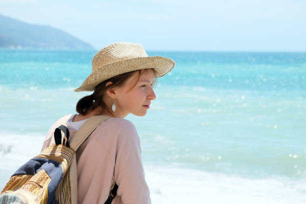 istock Girl tourist on the beach 1017661154
