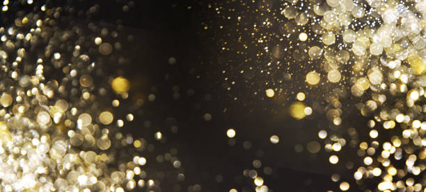 istock Golden (Christmas, New Year) Glitter Lights Defocused Background 1017672922