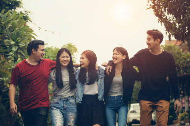 istock asian younger freelance team laughing with happiness after work project successful 1017676252