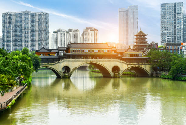 istock Nine hole bridge and skyscraper in chuengdu,china 1017676452