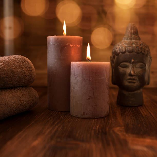 istock Wellness decoration with candles and buddha face 1017677042