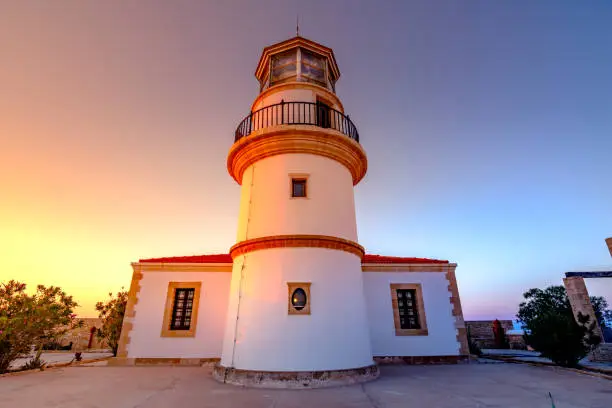 Photo of The lighthouse on Gavdos island at sunset, Crete, Greece.