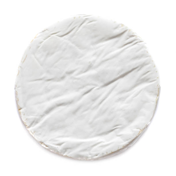 White Soft Brie Cheese. Camembert  isolated on white background, top view. 