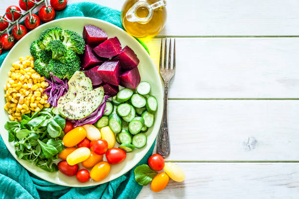 istock Salad mix plate shot from above on light green picnic table 1017706732