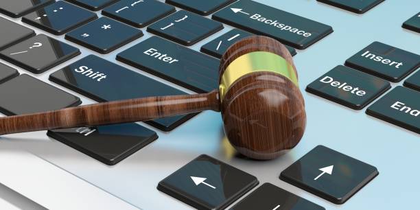 istock Auction gavel on a keyboard. 3d illustration 1017713766