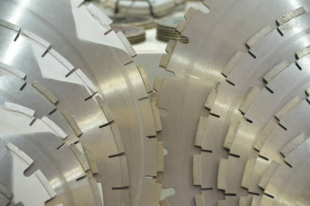 istock blade of a chainsaw, neatly lined up in a row 1017725300