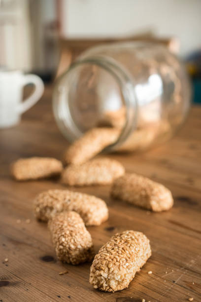 istock freshly baked homemade sesame biscuits on wood 1017768166