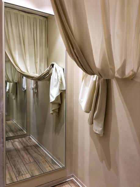 Mirrors Mirrors fitting room stock pictures, royalty-free photos & images