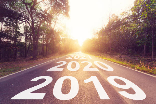istock Empty asphalt road and New year 2019 concept. Driving on an empty road to Goals 2019. 1017796014