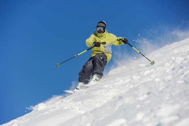 istock Skier running down the mountain slope in Gudauri, Georgia 1017796078