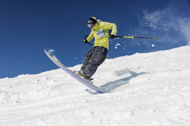 istock Skier jumping from the mountain slope in Gudauri, Georgia 1017796160