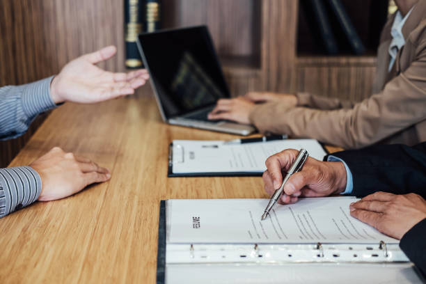 istock Business man explaining about his profile to two senior manager sitting in during job Interview, interview the job and hiring 1017800978