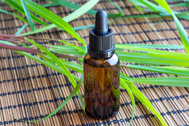 istock A bottle of lemon grass essential oil with fresh lemon grass 1017804462