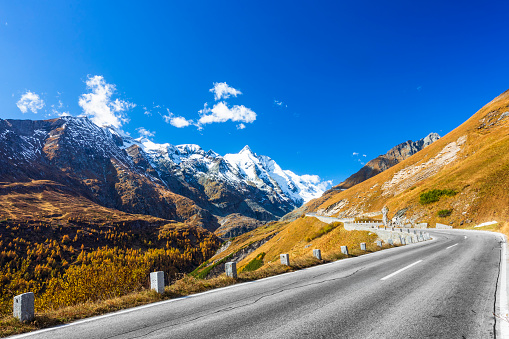 Picturesque landscape with mountain road in Alps