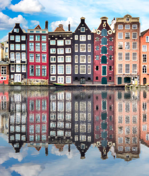 istock Amsterdam architecture and Damrak canal, Netherlands 1017818930