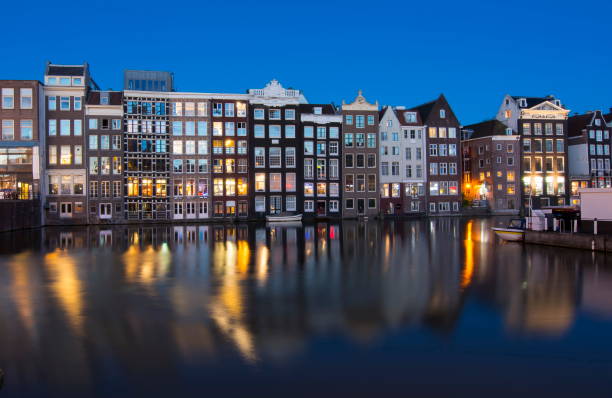 istock Damrak canal at night, Amsterdam, Netherlands 1017819064