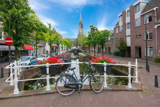 istock Delft canals and New church tower, Netherlands 1017819124