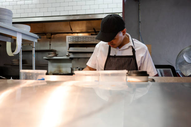 istock Mexican chef working in an authentic Mexican restaurant 1017826920