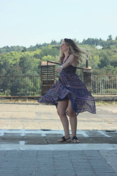 istock Woman dancing on the roof 1017830802