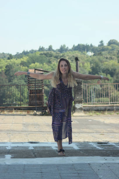 istock Woman dancing on the roof 1017830842
